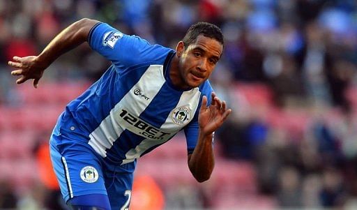 Wigan Athletic's midfielder Jean Beausejour chases the ball